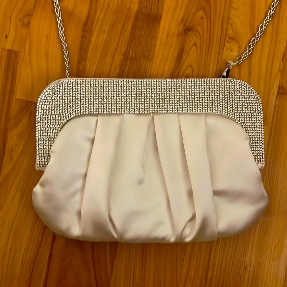 Ivory bridal satin clutch with beaded clasp.